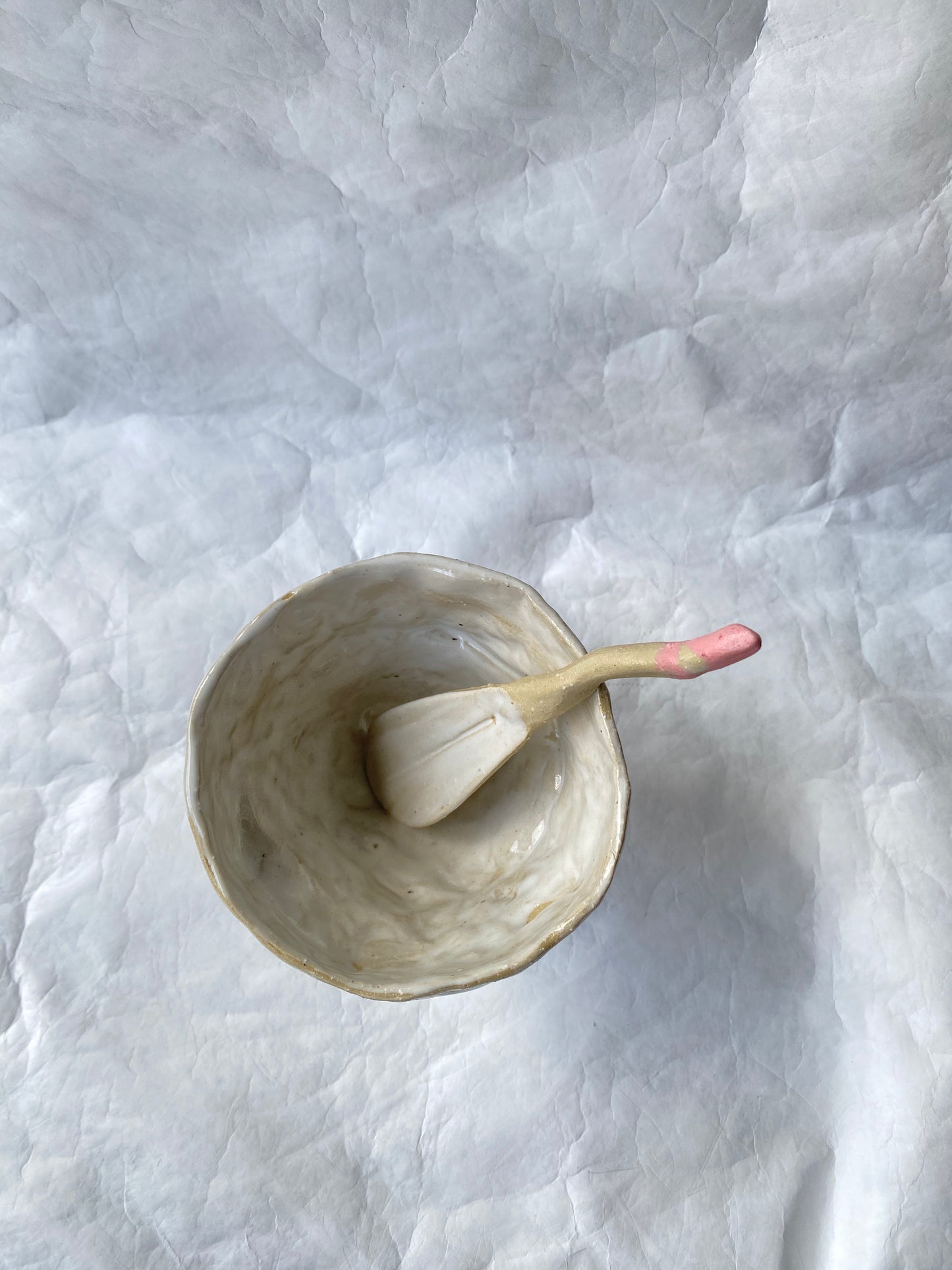 A hand-built sundae cup with raw textures and imperfect edges, part of the foRM of Mondays sculptural signature objects for tactile connections