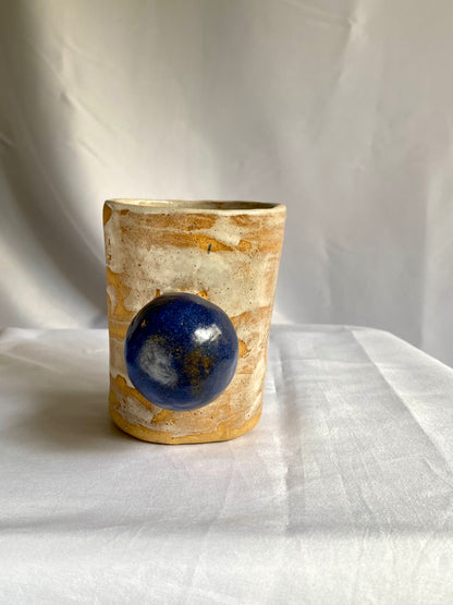 Interesting Ceramic cup with a blue sphere handle by foRM of Mondays 