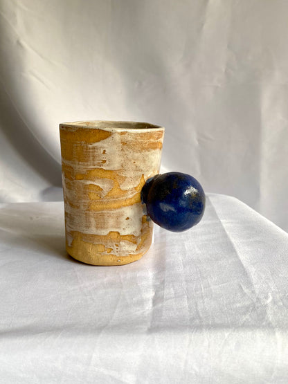 One-off, hand-built ceramics cup that encourage a rethink of everyday objects.