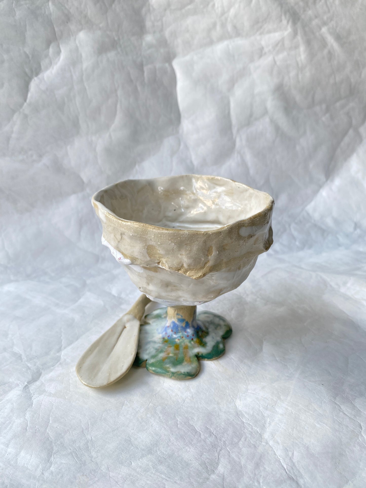 A hand-built sundae cup with raw textures and imperfect edges, part of the foRM of Mondays sculptural signature objects for tactile connections 
