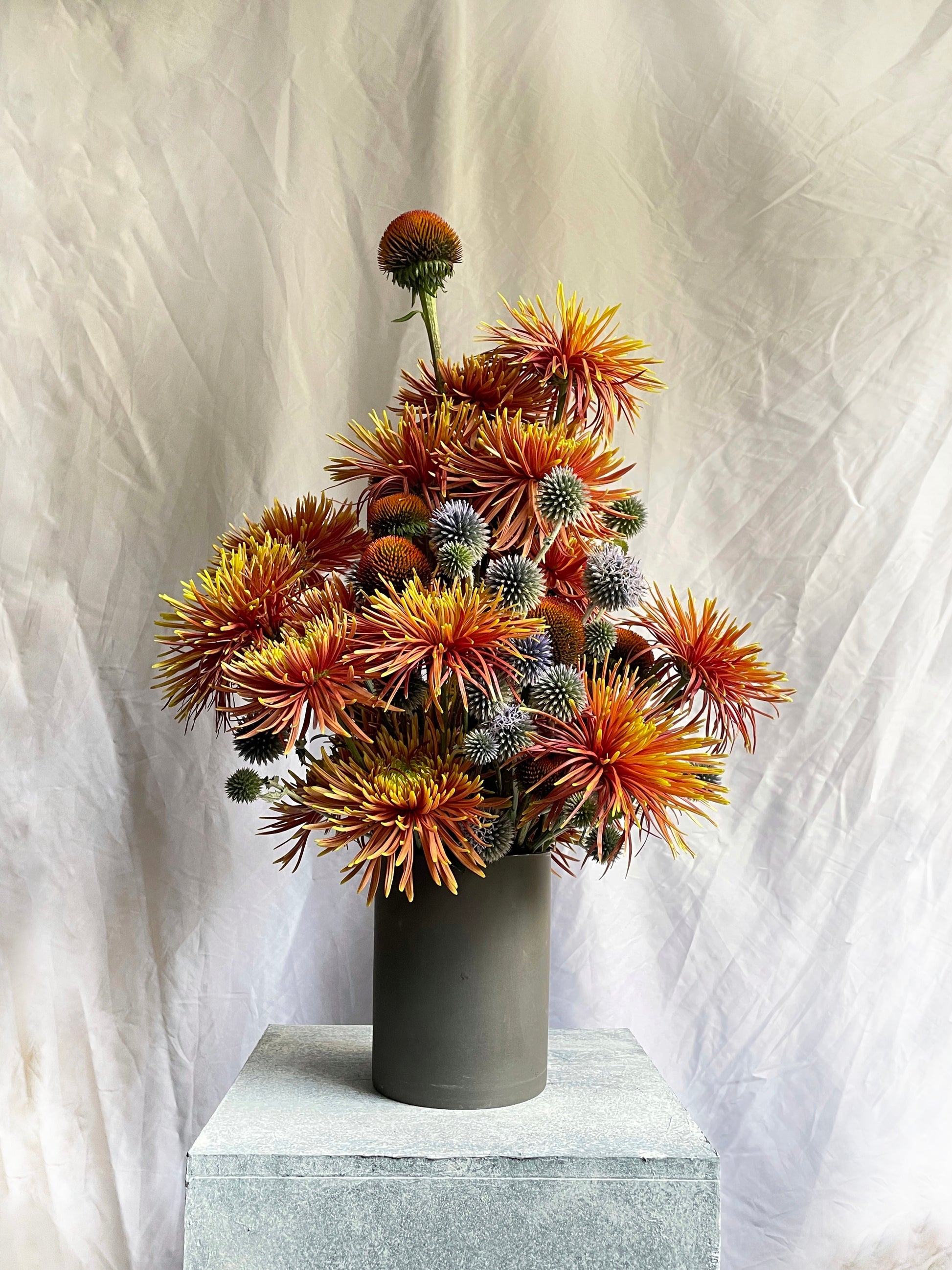 A sculptural floral composition by foRM of Mondays, featuring curated seasonal ingredients and a distinct, organic form.