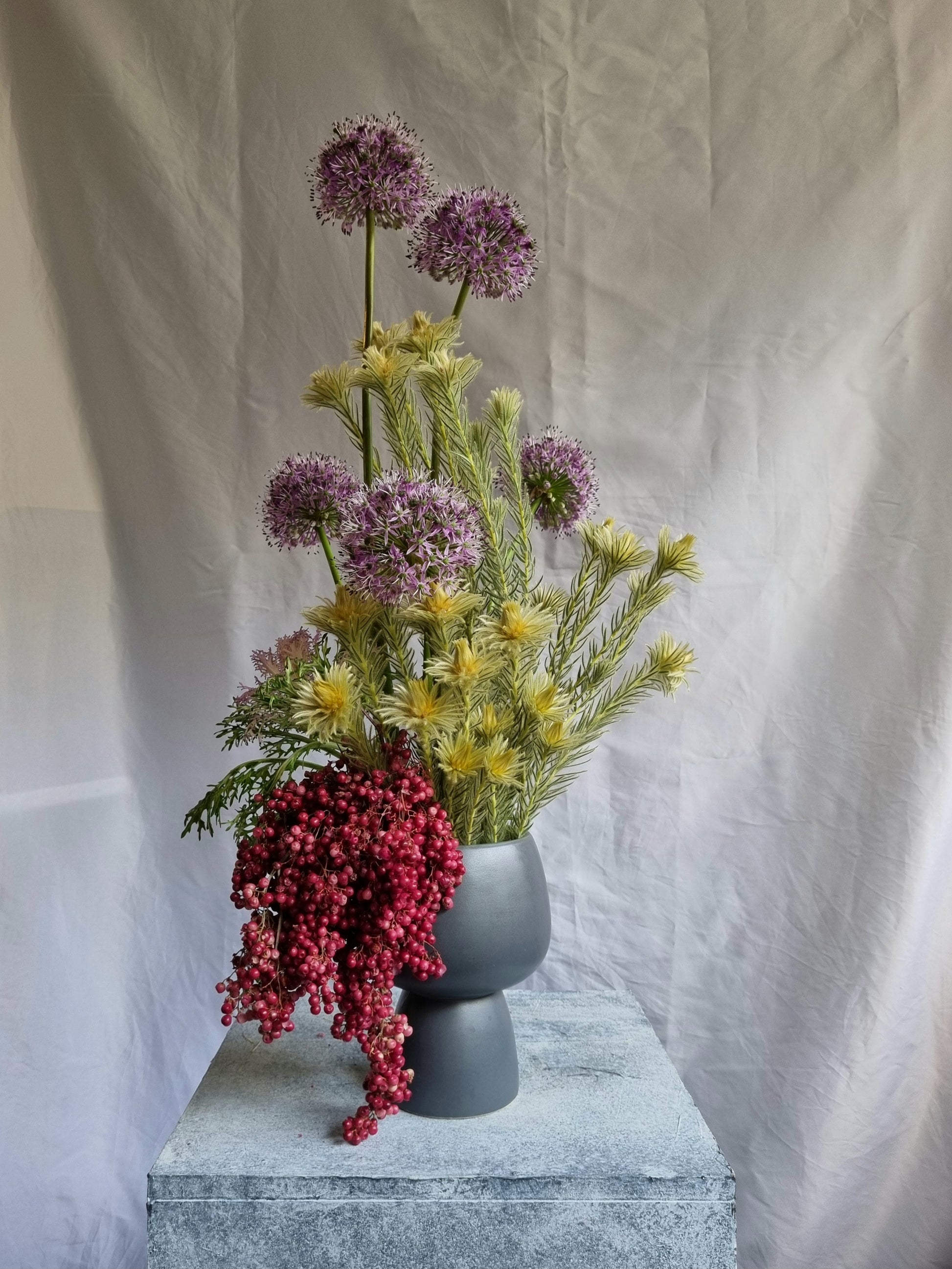 A sculptural floral composition by foRM of Mondays, featuring curated seasonal ingredients and a distinct, organic form.