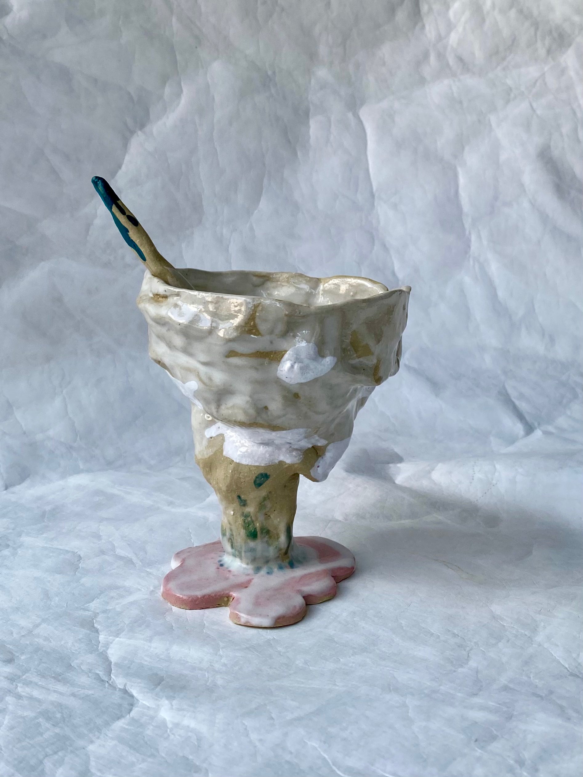 A hand-built sundae cup with raw textures and imperfect edges, part of the foRM of Mondays sculptural signature objects for tactile connections 
