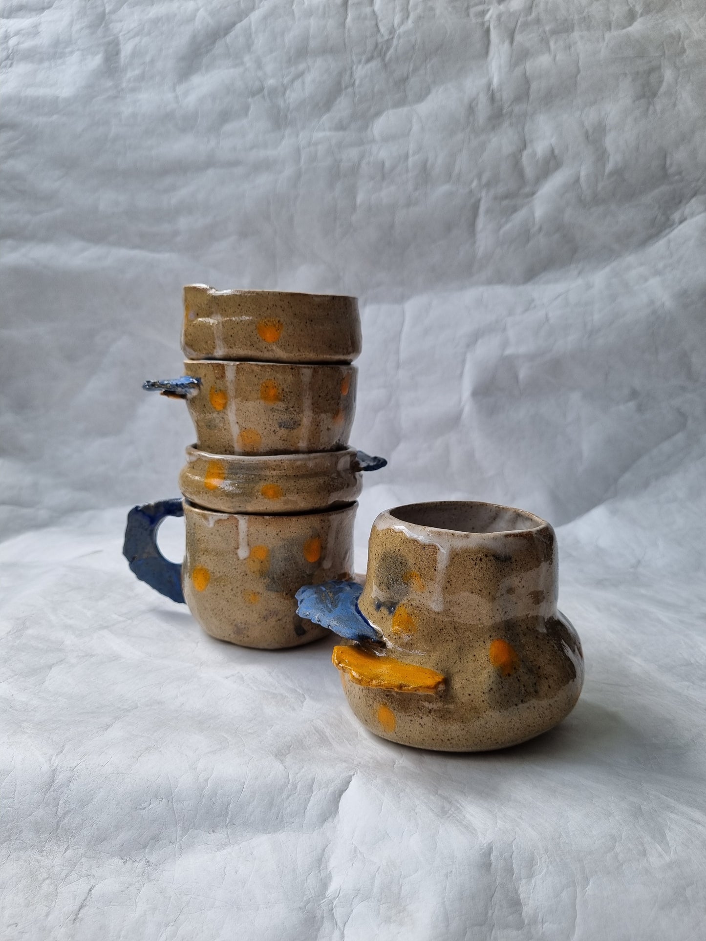 Whimsical hand built ceramic cups by foRM of Mondays