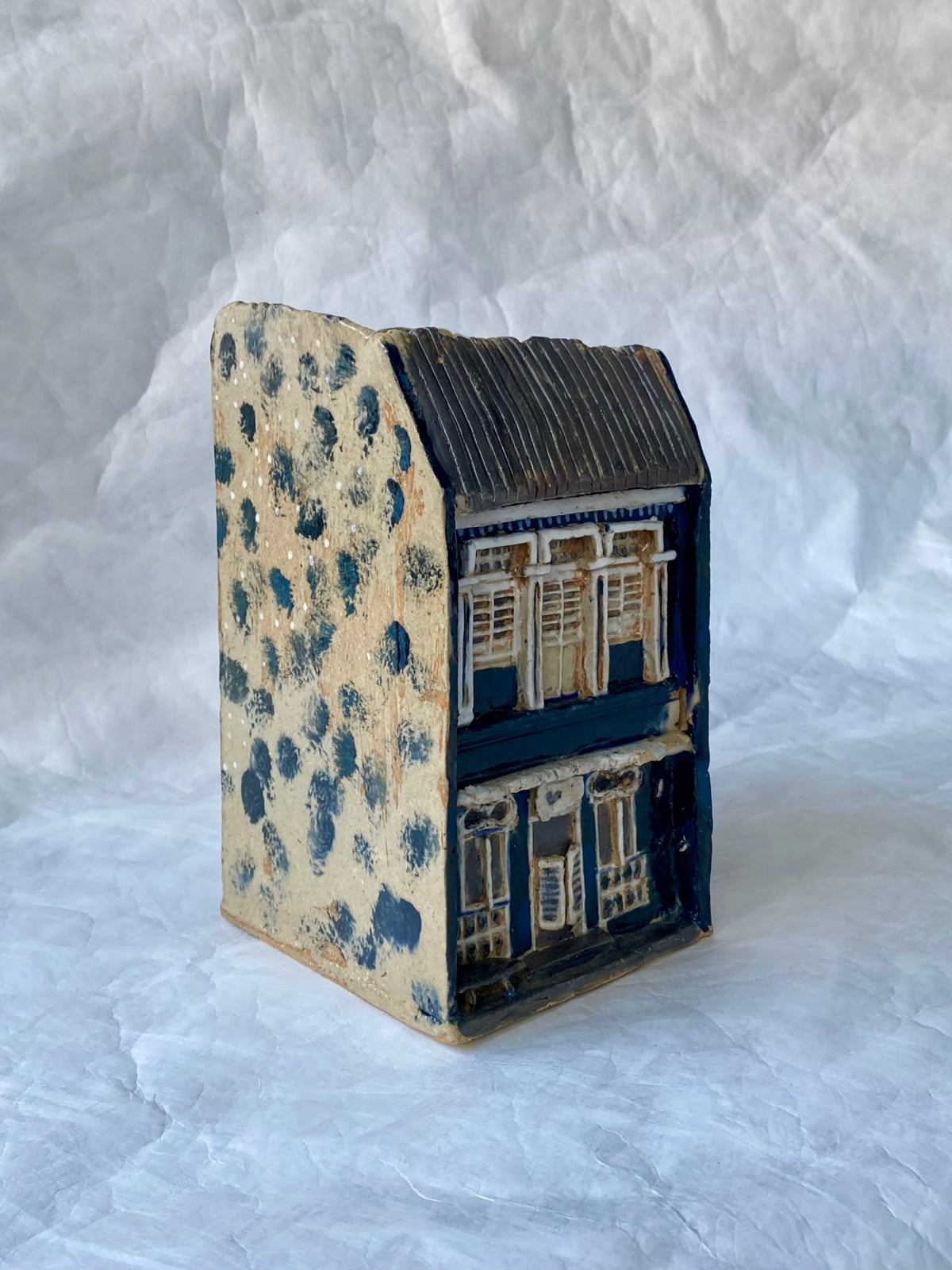 Shophouse Vessel: A hand-built stoneware ceramic vase inspired by Singapore heritage architecture and urban density, featuring raw textures by foRM of Mondays.