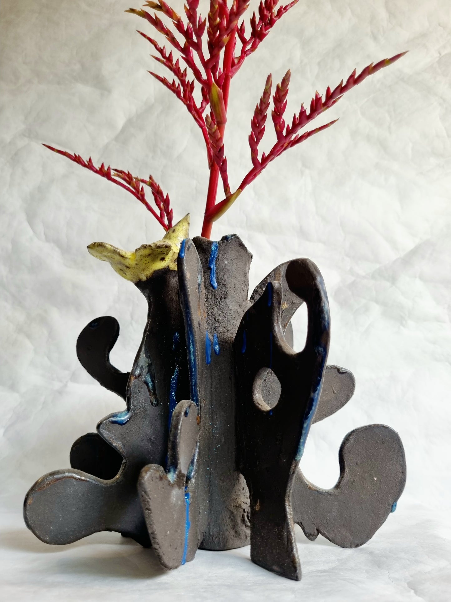 A limited-series ceramic vessel from the Sunbirds Collection by foRM of Mondays, featuring organic, highly textured clay work with abstract references to a kinetic energy 