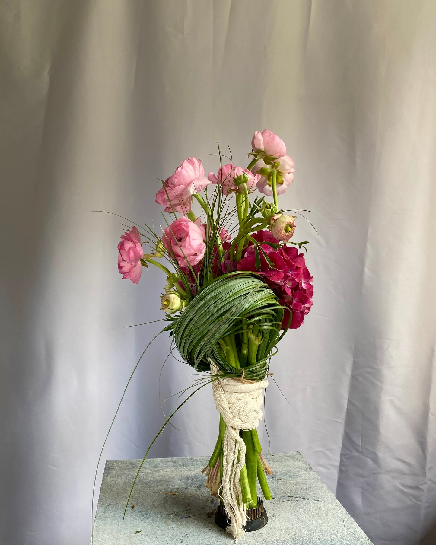 A sculptural floral composition by foRM of Mondays, featuring curated seasonal ingredients and a distinct, organic form.